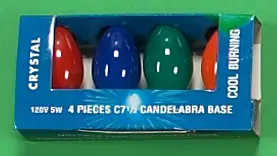 Multicolored C7.5 bulbs on green background