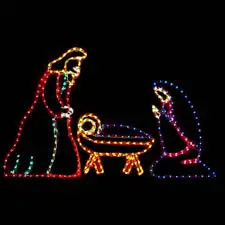 Nativity scene in colorful Christmas lights