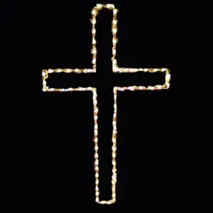 Illuminated cross in darkness