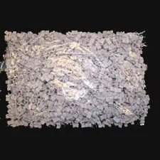 Bag of shredded documents on black background