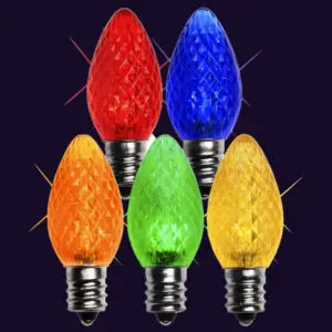 Colorful LED bulbs on dark background