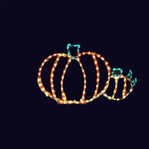 Festive pumpkin light display on black background