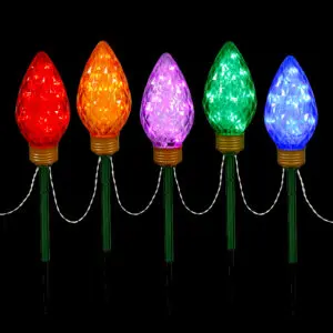 Colorful Christmas lights on black background