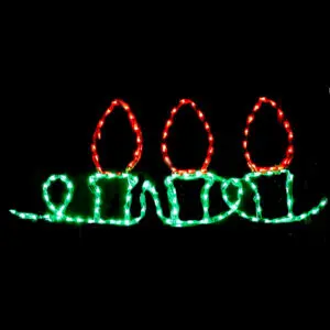 Festive candle lights in darkness