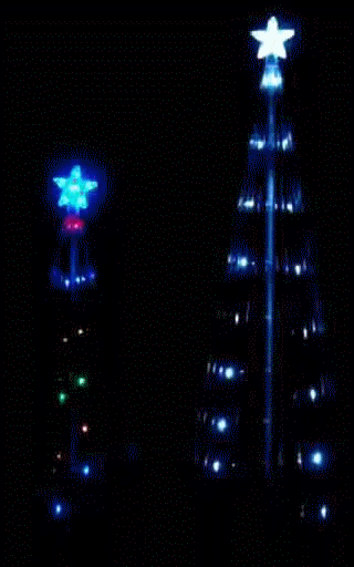 Glowing Christmas trees in the dark