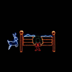 Christmas decoration with lit reindeer and gate